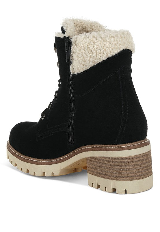 Inside back angle of Black Madoka Chunky Ankle Boots highlighting zipper closure and block heel.
