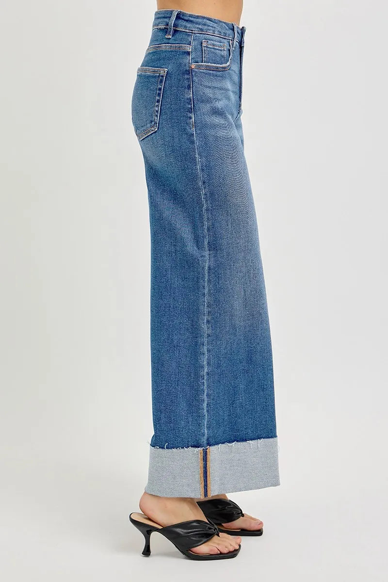 Sylvi tummy control jeans with cropped wide cuff, zip fly, and soft stretch denim.