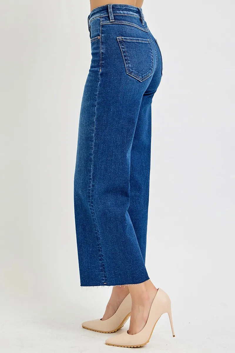 Side view of Adrina tummy control wide leg crop jeans, dark wash denim with flattering high rise fit.