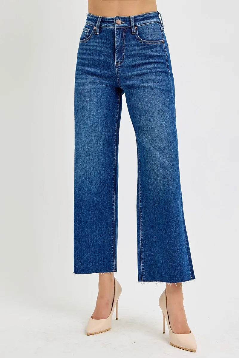 Front angle view of Adrina tummy control high rise jeans, wide leg cropped silhouette in dark wash.