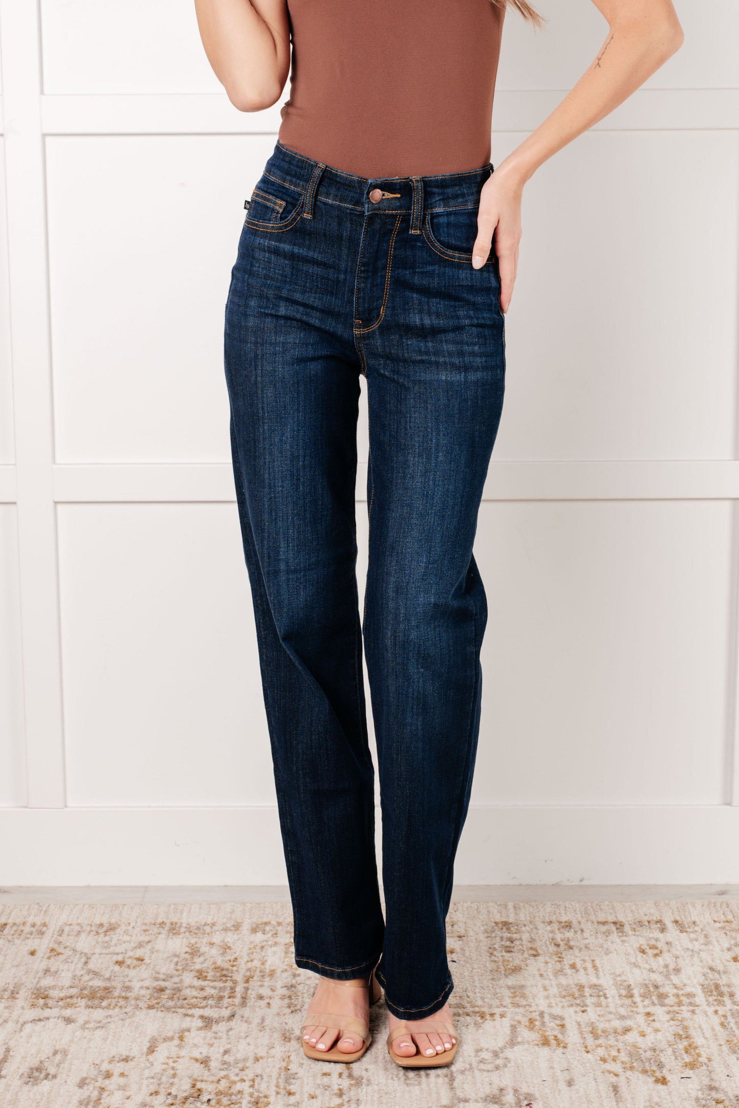 Judy Blue dark wash high-rise straight-leg jeans with a zip fly, 4-way stretch, and a non-distressed design.