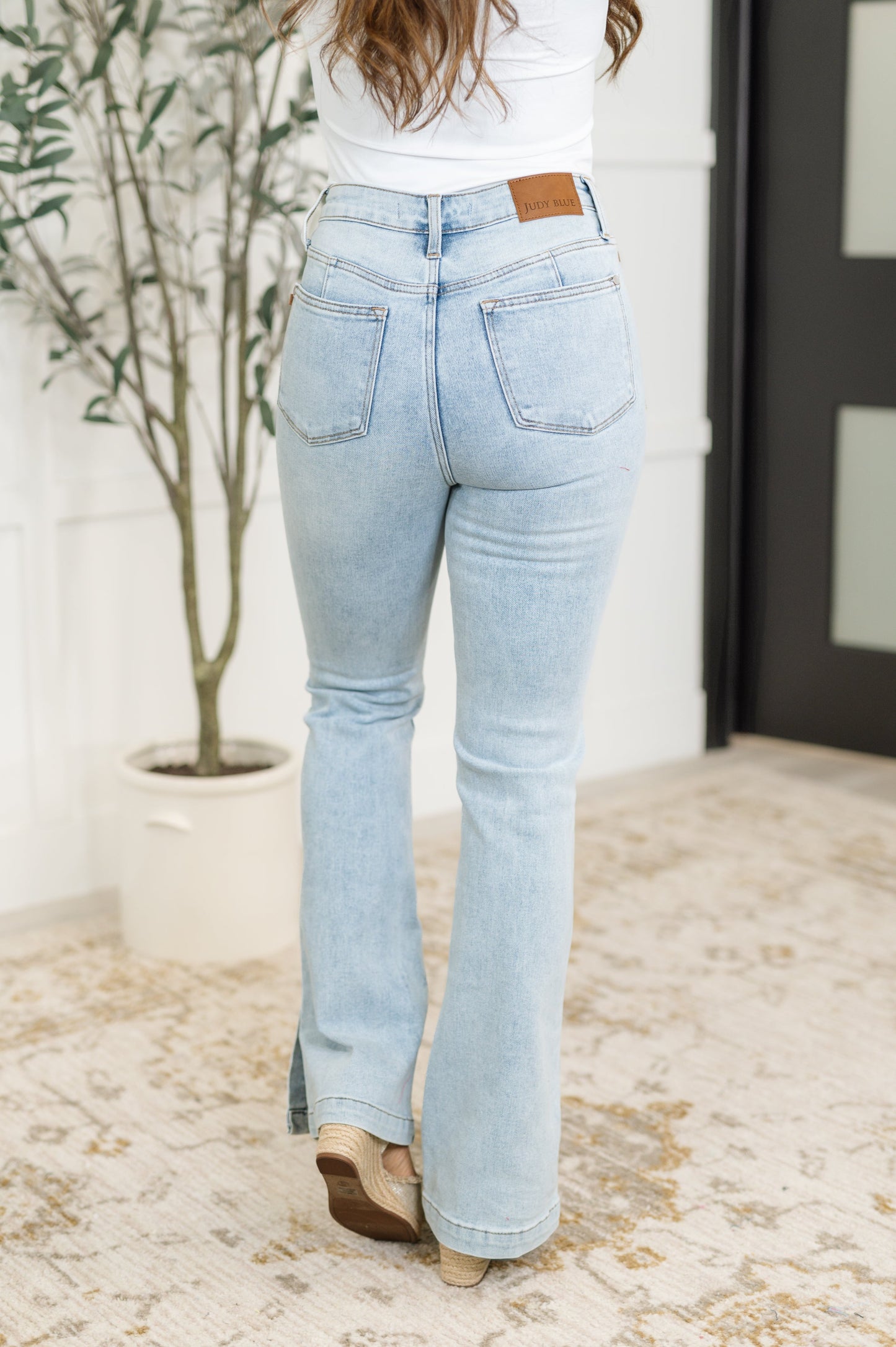 Back view of Alexis High Rise Judy Blue Slim Bootcut Jeans in light wash.