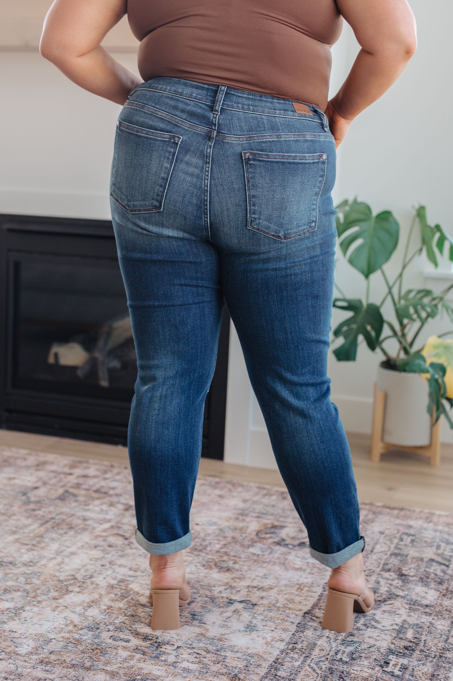 Back view of plus size Judy Blue slim fit jeans with 4-way stretch and zip fly.