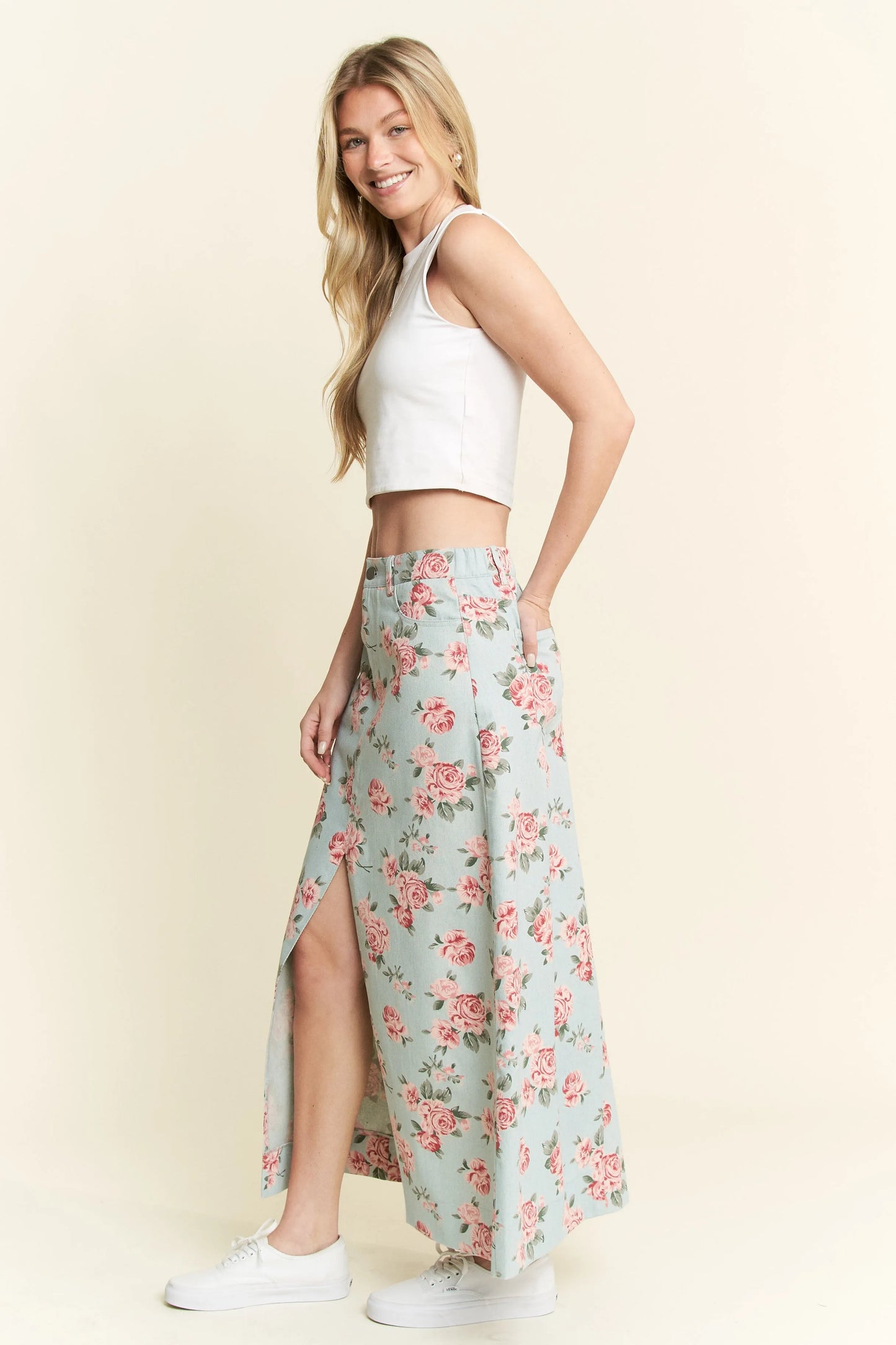 High-waisted size-inclusive denim maxi skirt with vintage floral design and slight stretch for everyday comfort.