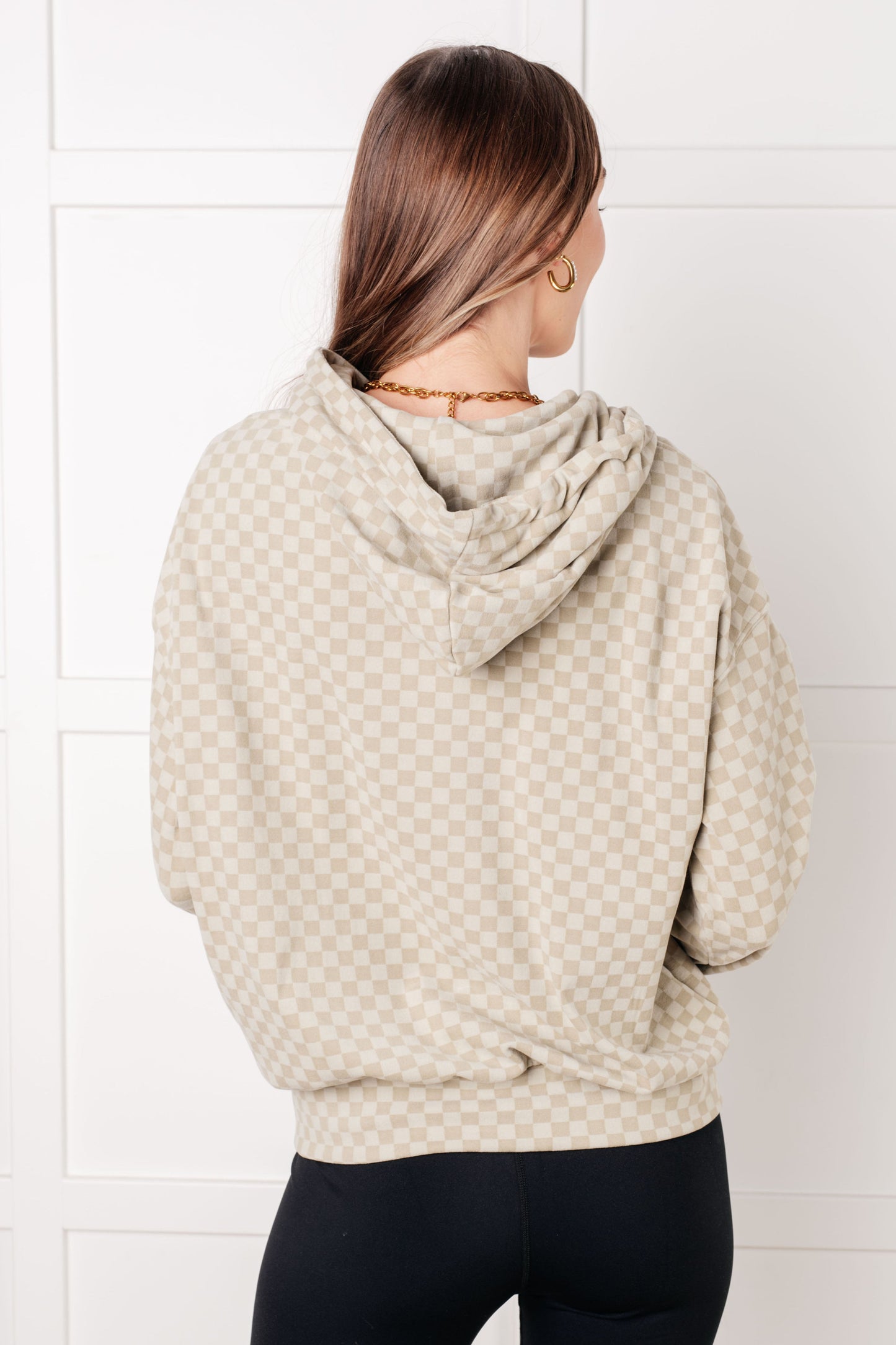 Back view of Dalia Checkered Hoodie showing sage checkered pattern and hood.