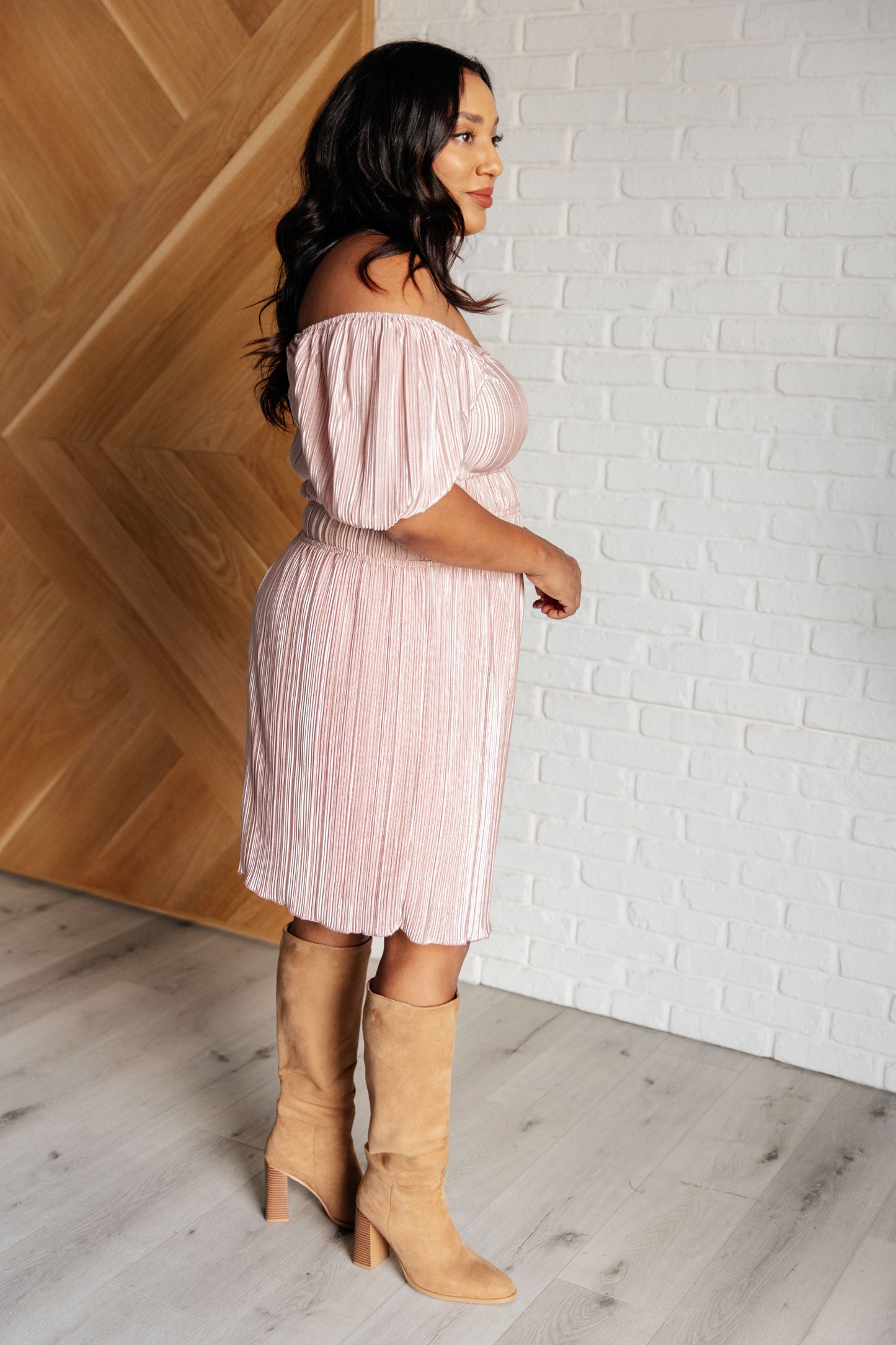 Side view of plus size Astrid Balloon Sleeve Dress with off-shoulder neckline and balloon sleeves.