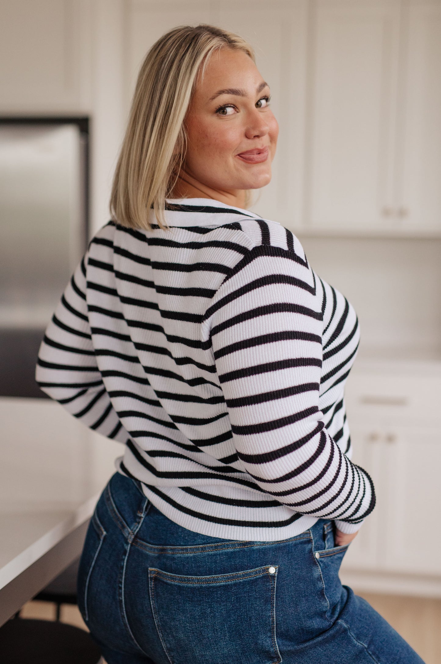 Back view of plus size Bailey V-Neck Striped Sweater, collared neckline, relaxed comfort fit, striped cotton knit.