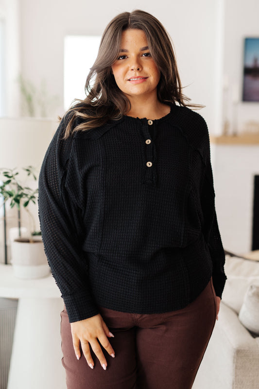 Plus size Bea Black Waffle Knit Henley Top front view with button closure and raw seam.
