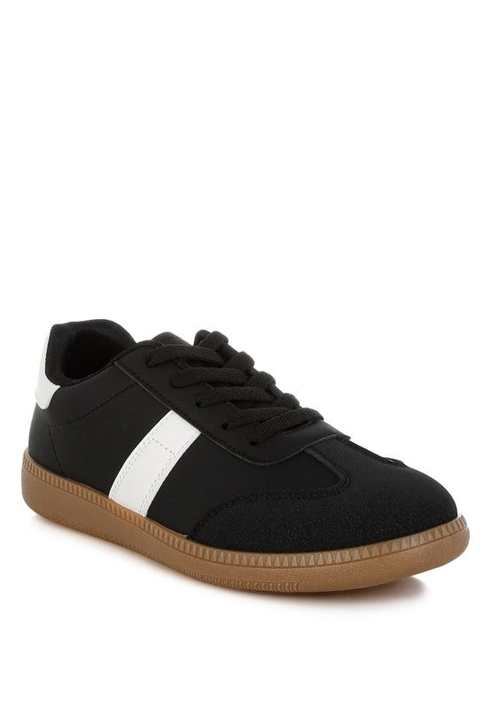 Black crossover lace-up flatform sneakers with round toe and contrasting sole.