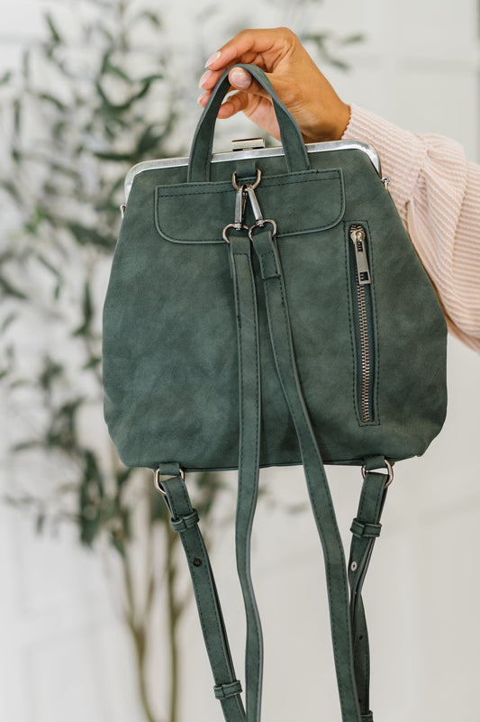 Back view of Bridget Backpack in Peacock showing vertical zipper and adjustable straps.