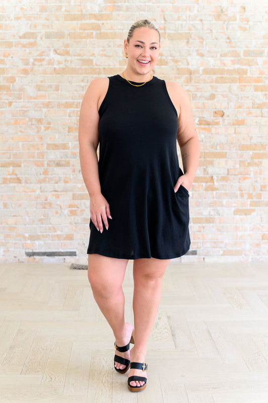 Plus size Brynlee black crisscross cut-out back dress, sleeveless, high-stretch knit.