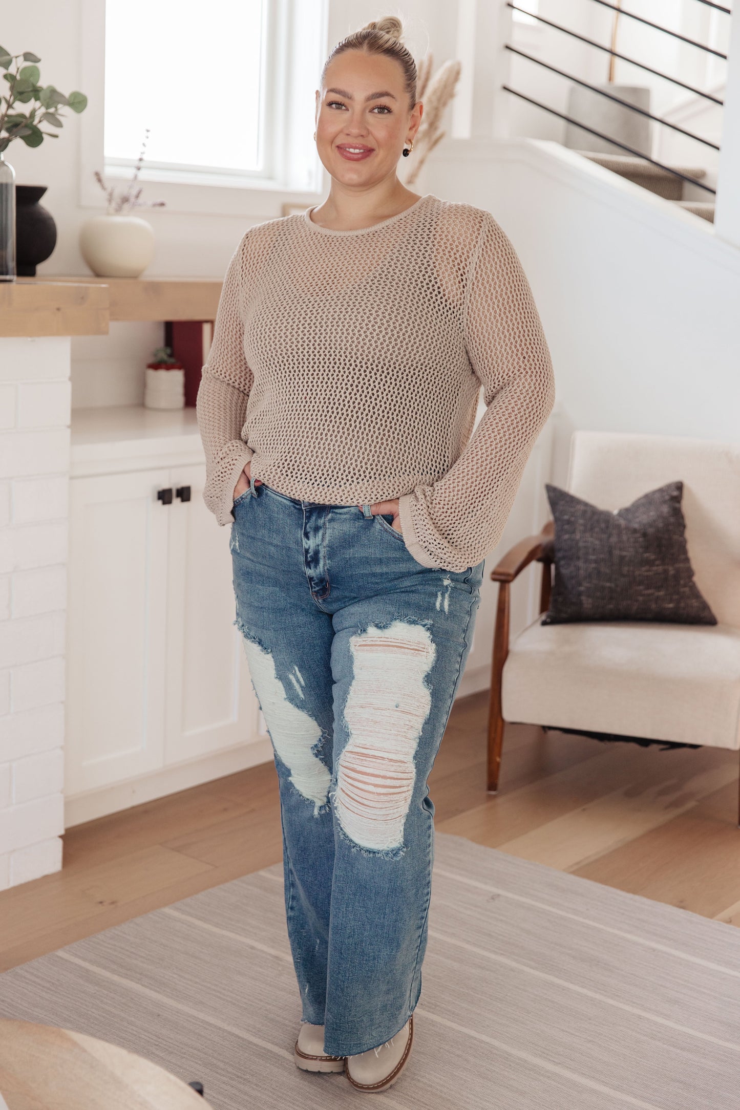 Plus size full body view of Landis Loose Knit Top in cream, sheer sweater knit with round neckline and relaxed silhouette.