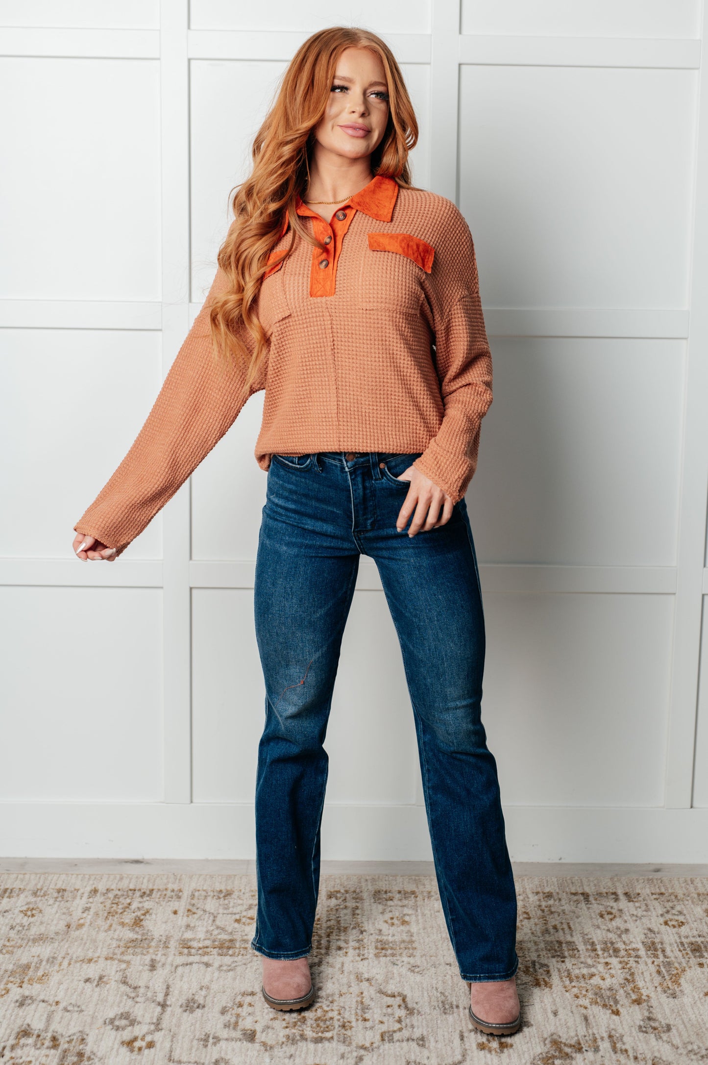 Model wearing Emerie Waffle Knit Contrast Trim Top styled with jeans.
