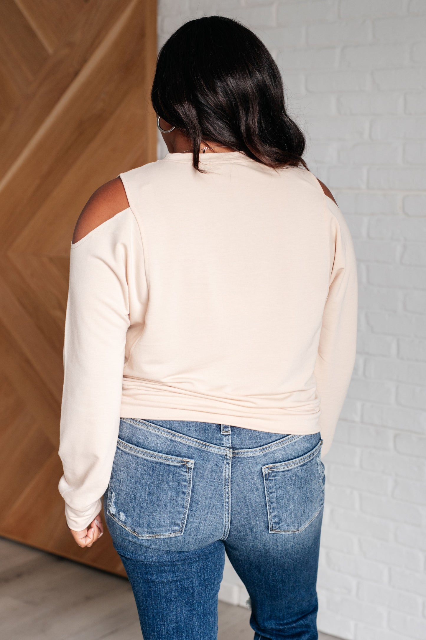 Plus size back view of Dace Cold Shoulder Blouse with long sleeves and cozy, casual chic style.