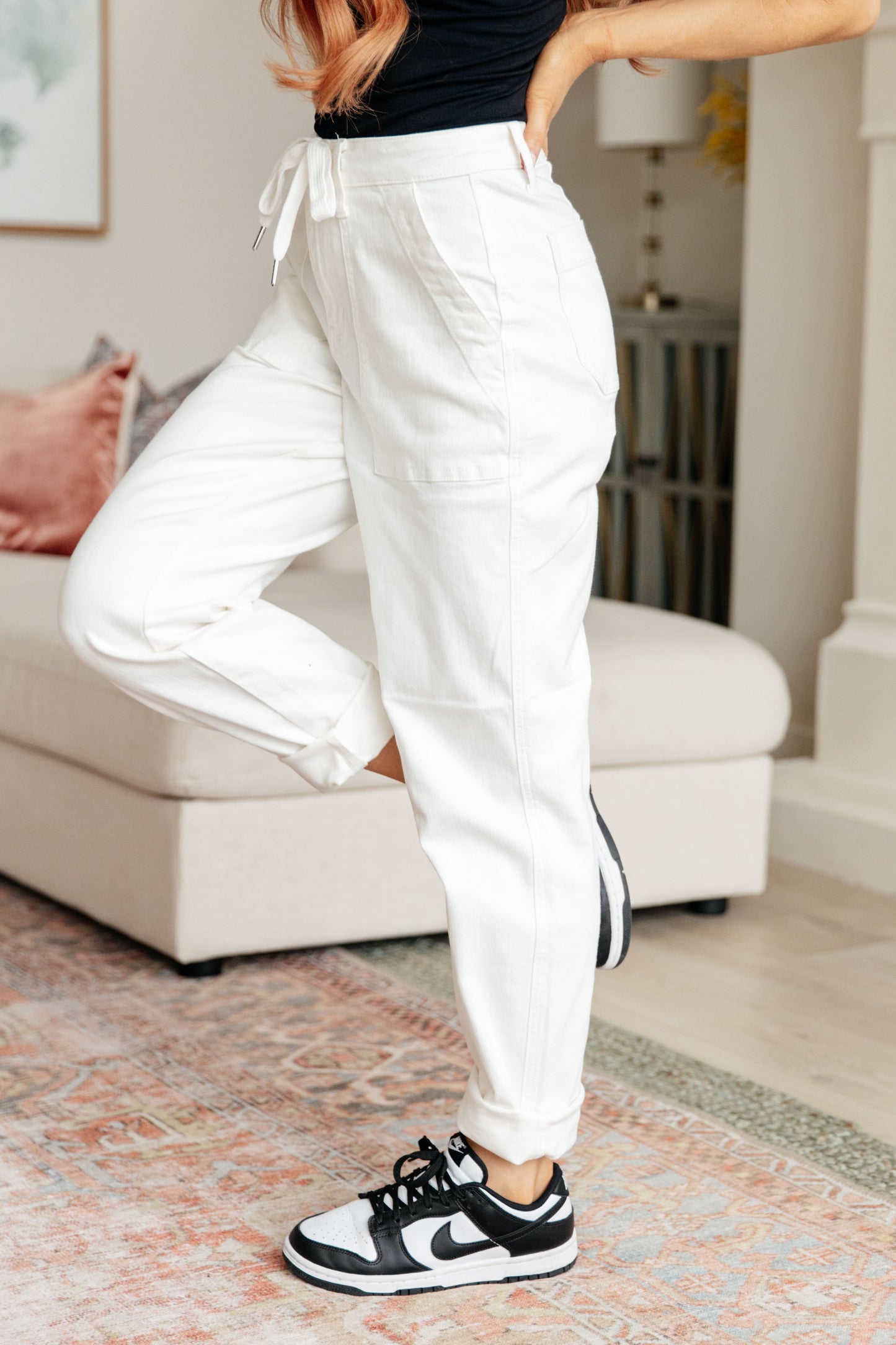 Side view Judy Blue Charlene ecru high rise jogger jeans with cuffed hem and casual polished fit.