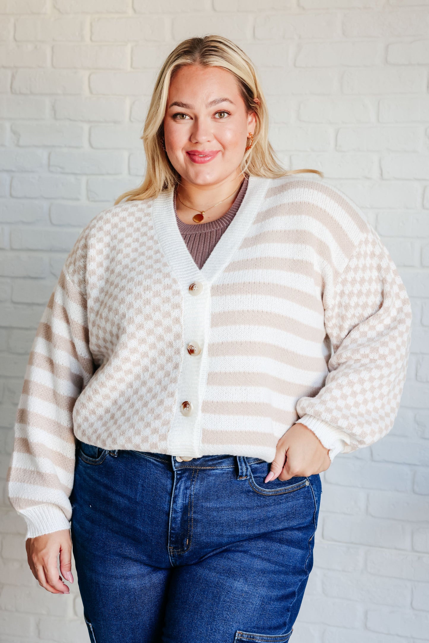 Plus size Eve Cardigan front view styled with a ribbed knit top