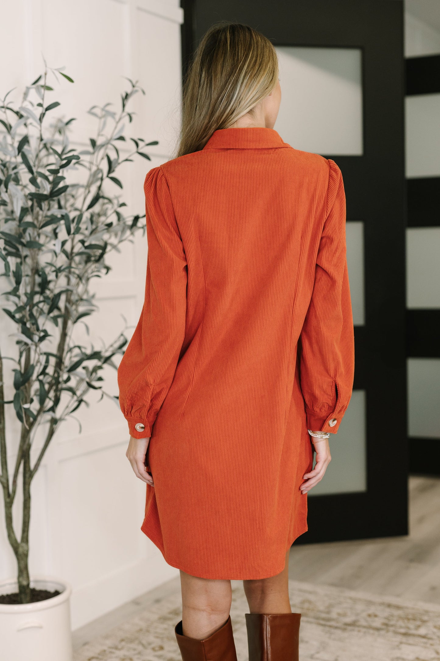 Back view of Clea Corduroy Shirt Dress showing relaxed fit and corduroy texture.