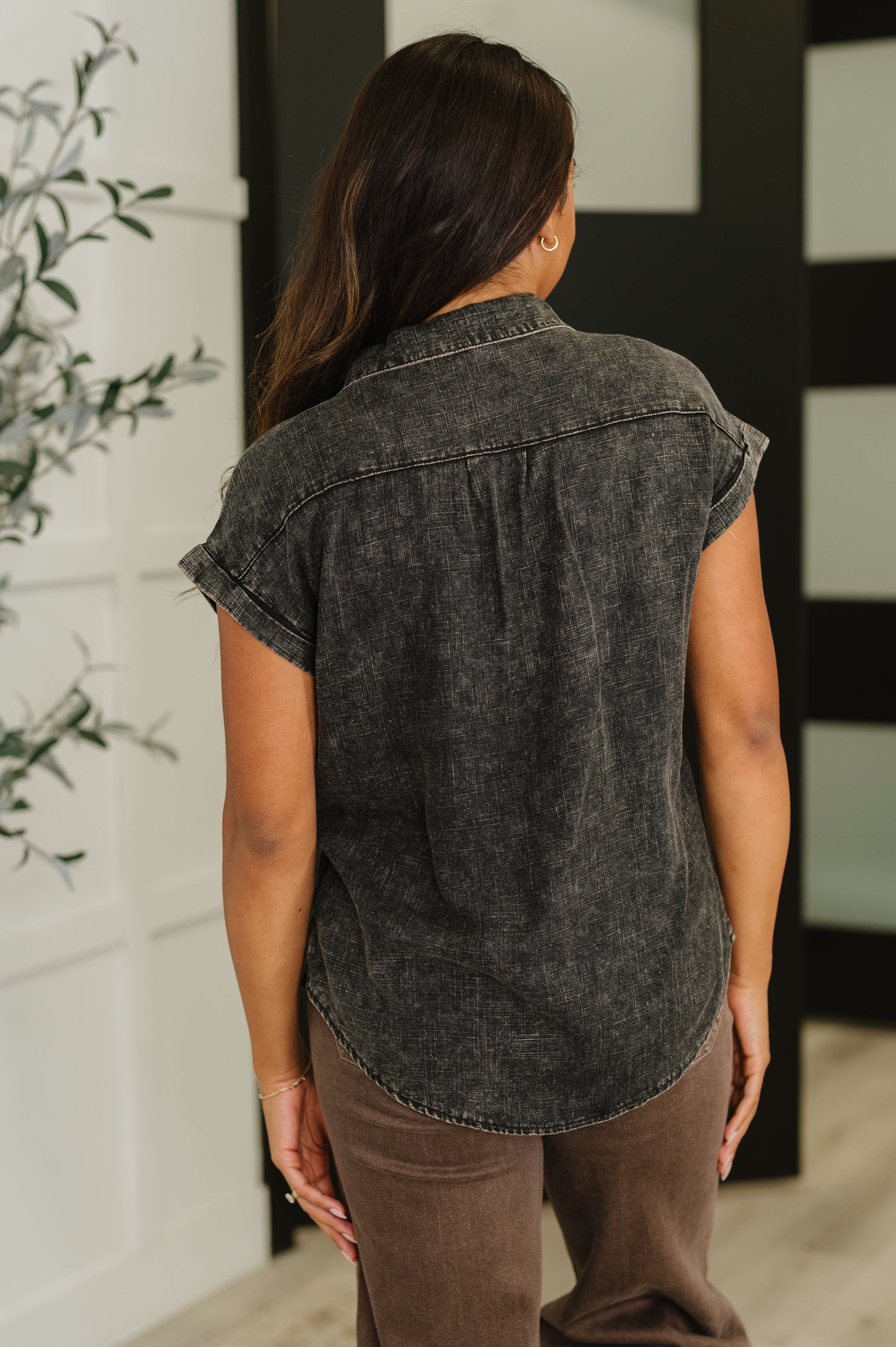 Back view of Waverly Button Down Blouse in lightweight ash black woven fabric