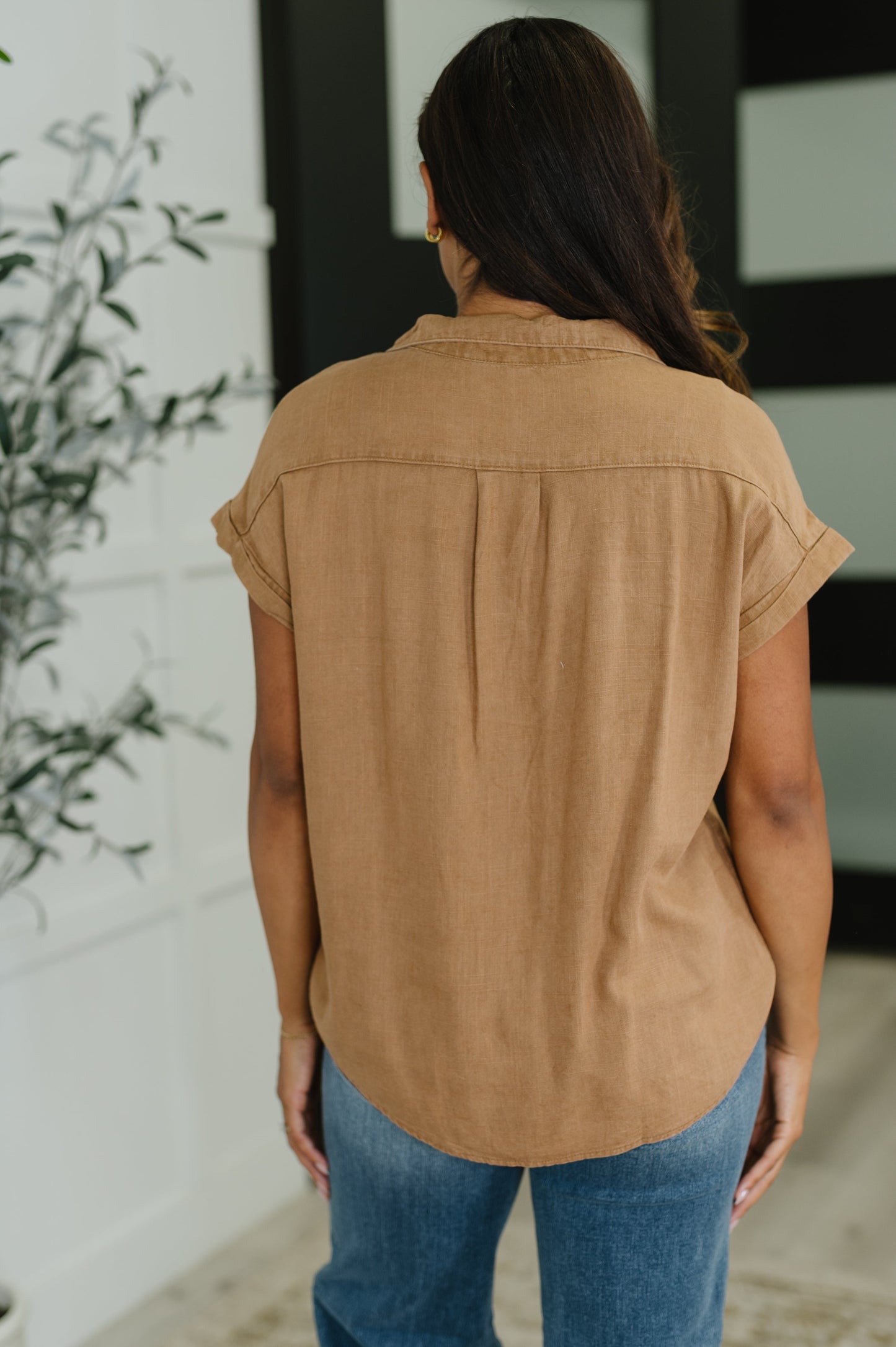 Back view of Waverly Button Down Blouse in lightweight deep camel fabric