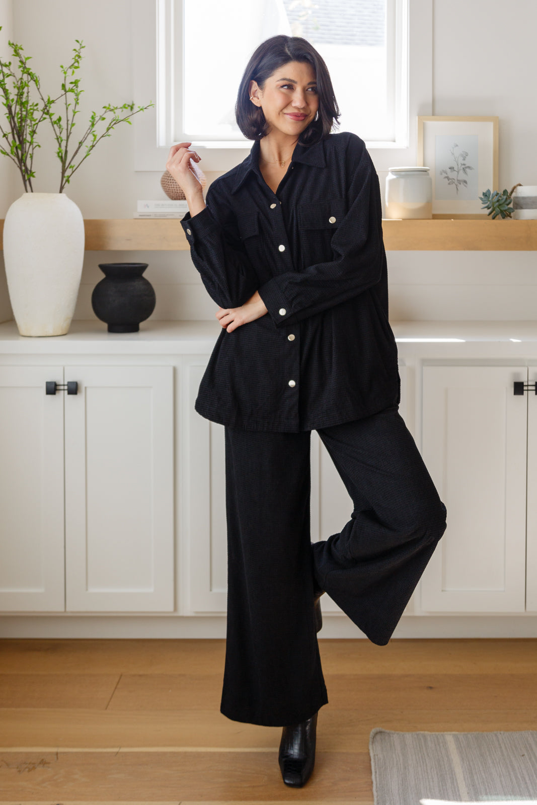 Full body Alanna Button Down Top styled with black pants, collared neckline visible