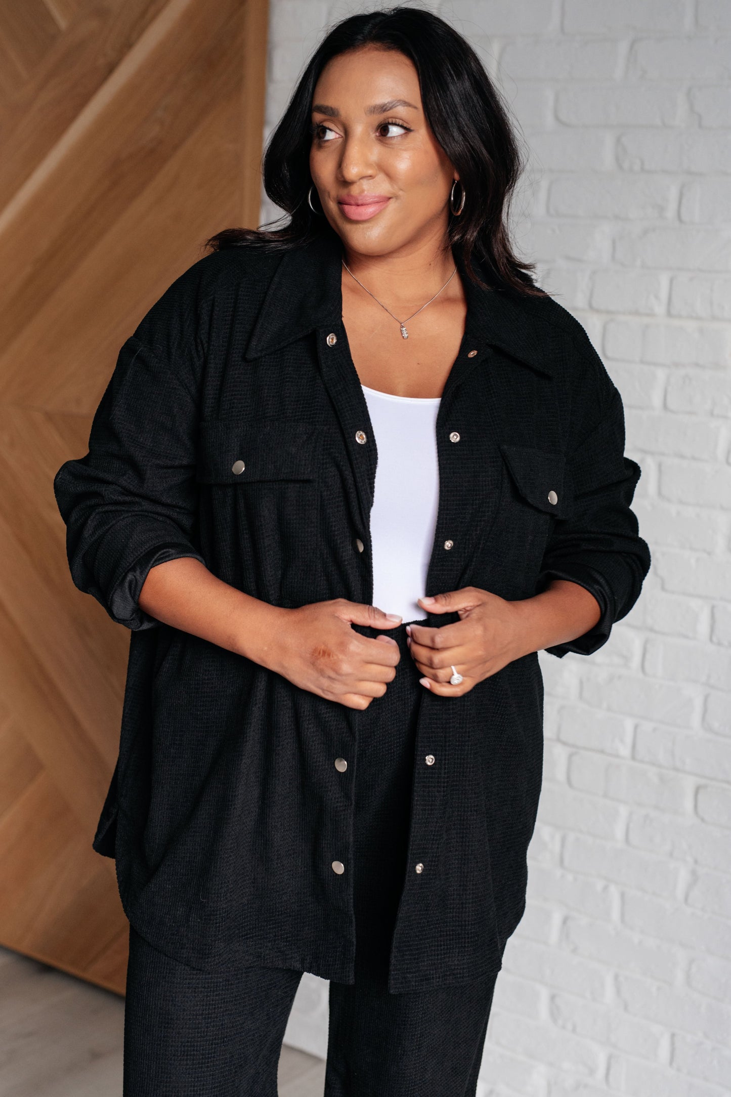 Plus size front view Alanna Button Down Top in black corduroy, oversized fit