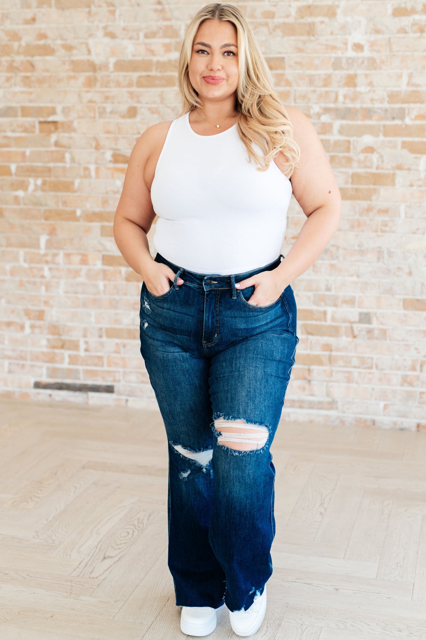 Plus size lightweight ribbed crop tank in white, round neckline front view.