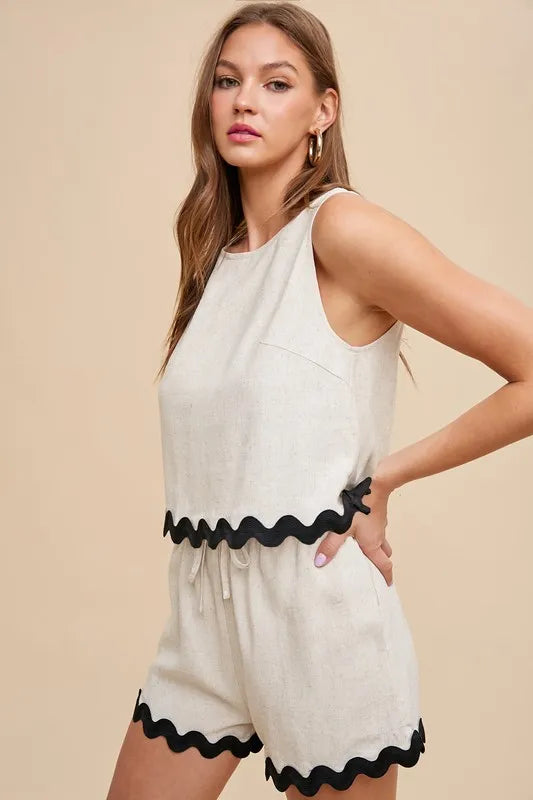 Natural color sleeveless top and shorts set with playful Ric Rac trim and frill details, perfect for summer outings.