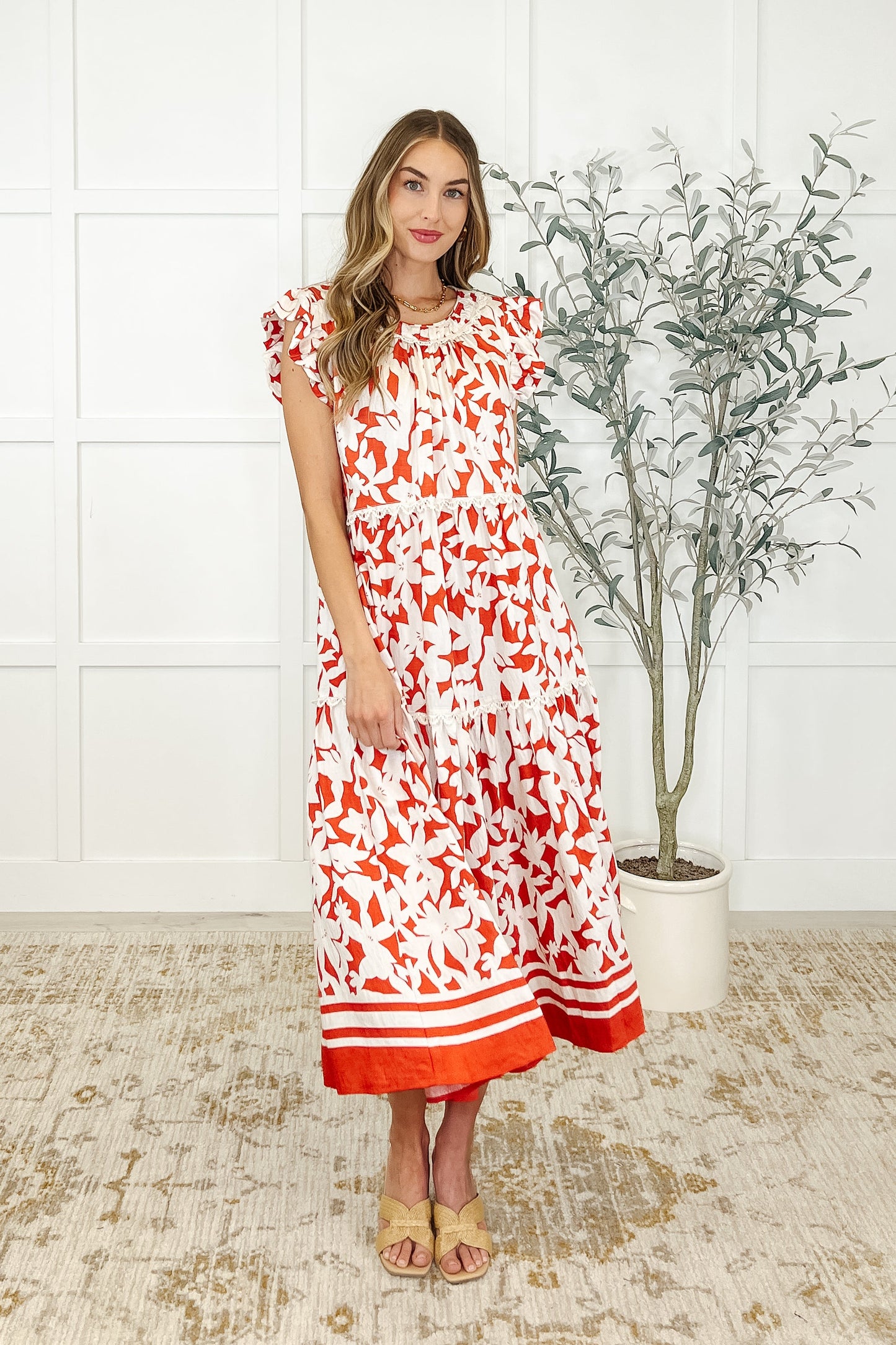 White and red Daine Tiered Dress front view with flutter sleeves and lace trim.