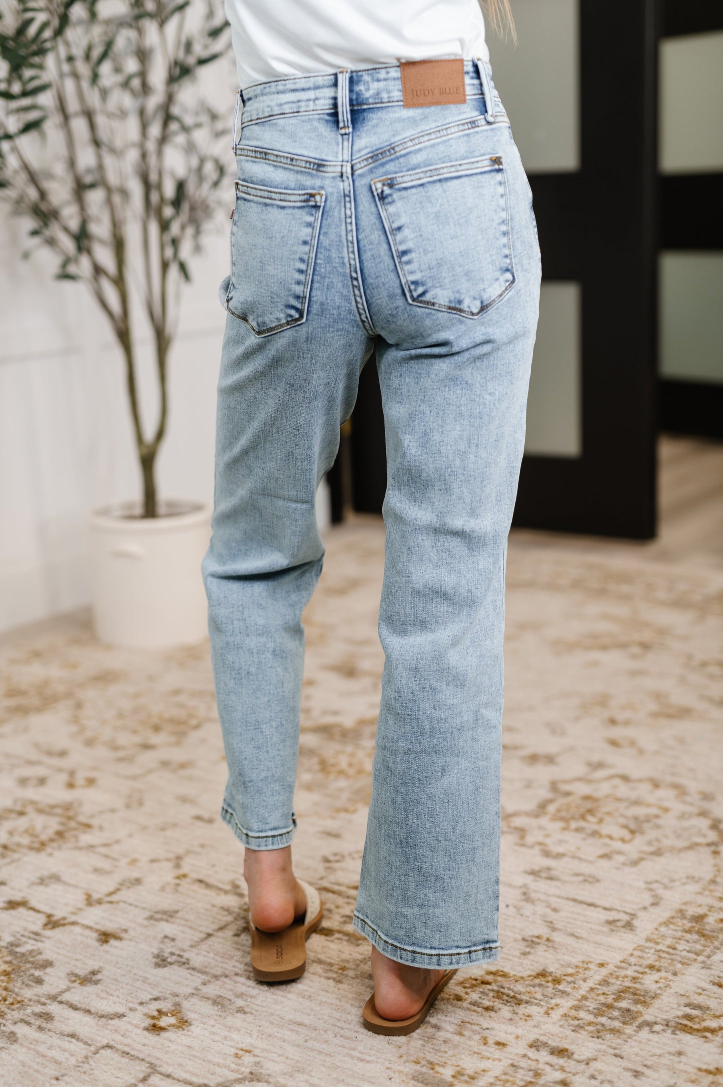 Straight fit Debbie high rise jeans in stone wash denim, Judy Blue back view.