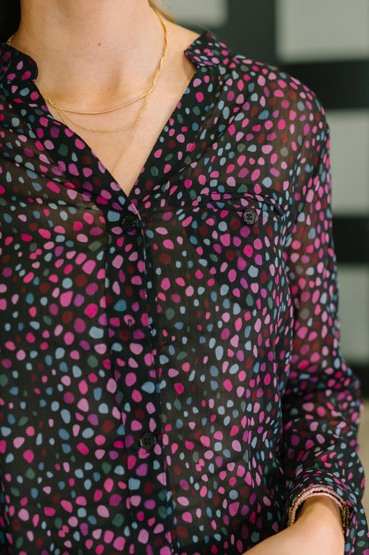 Close-up of Miranda Polka Dot Blouse button closures and neckline detail.