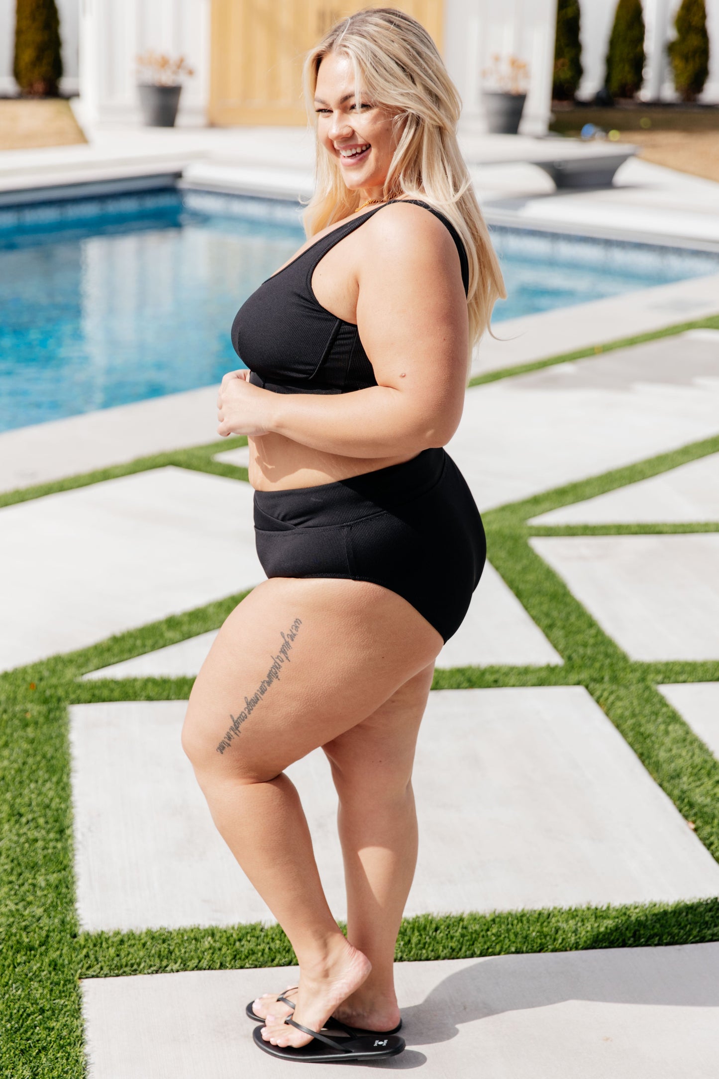 Side view plus size Dorilla two piece bikini, ribbed fabric, cheeky fit, and V-waistline.