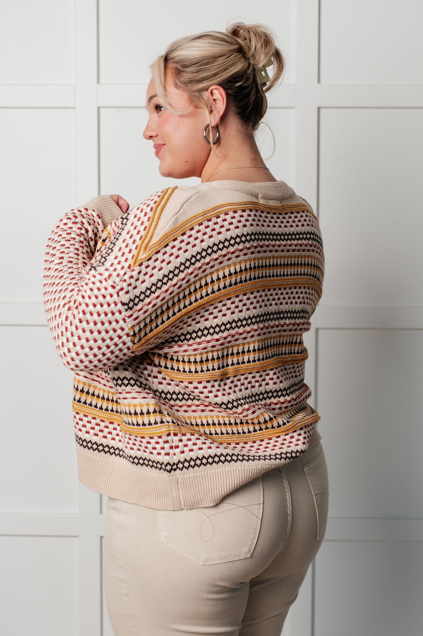 Plus size Ellie Striped Cardigan side angle, showcasing relaxed drop shoulder fit and ribbed sleeve cuffs.