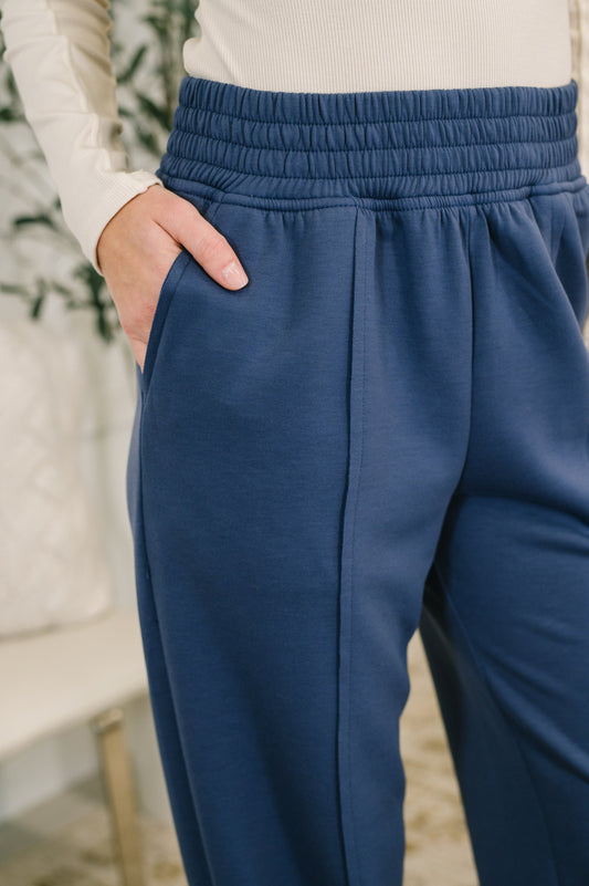 Close-up of Evani Jogger Bottoms showing front center seam and textured fabric.