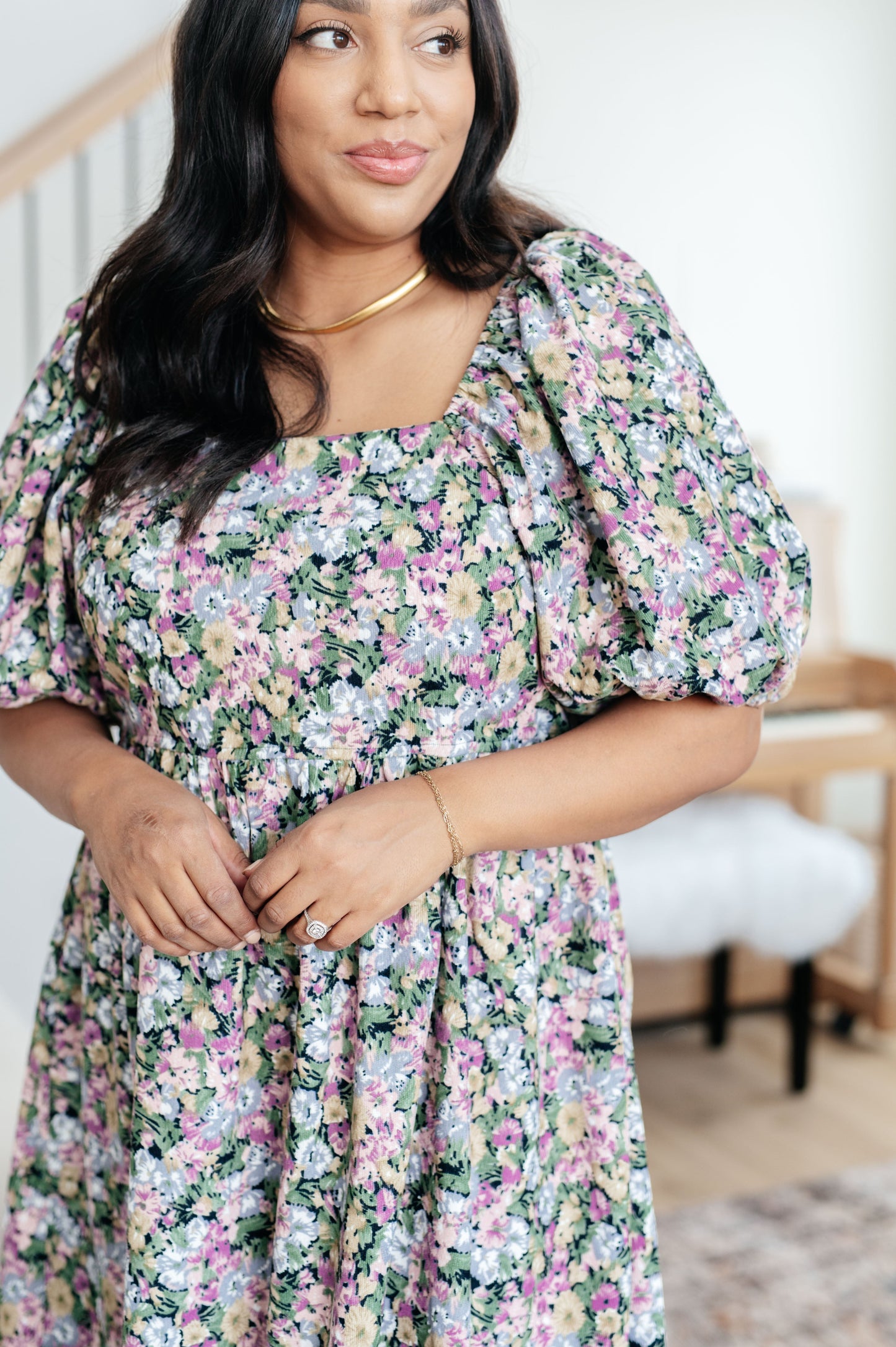 Close-up of Skyla Floral Dress showing pink and green floral print with soft velvet texture.