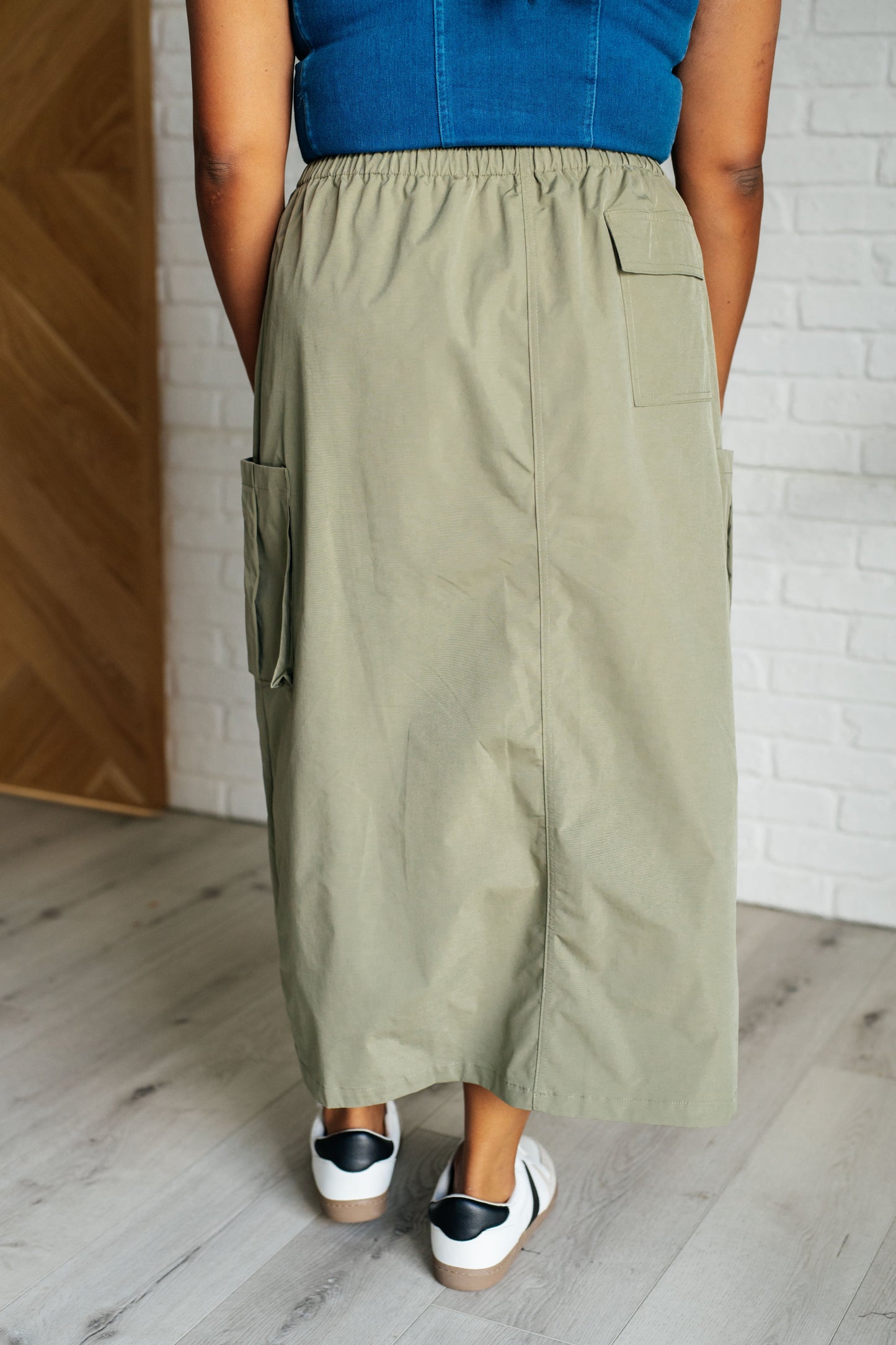Bodhi Cargo Skirt plus size back view showcasing elastic waistband and midi hem