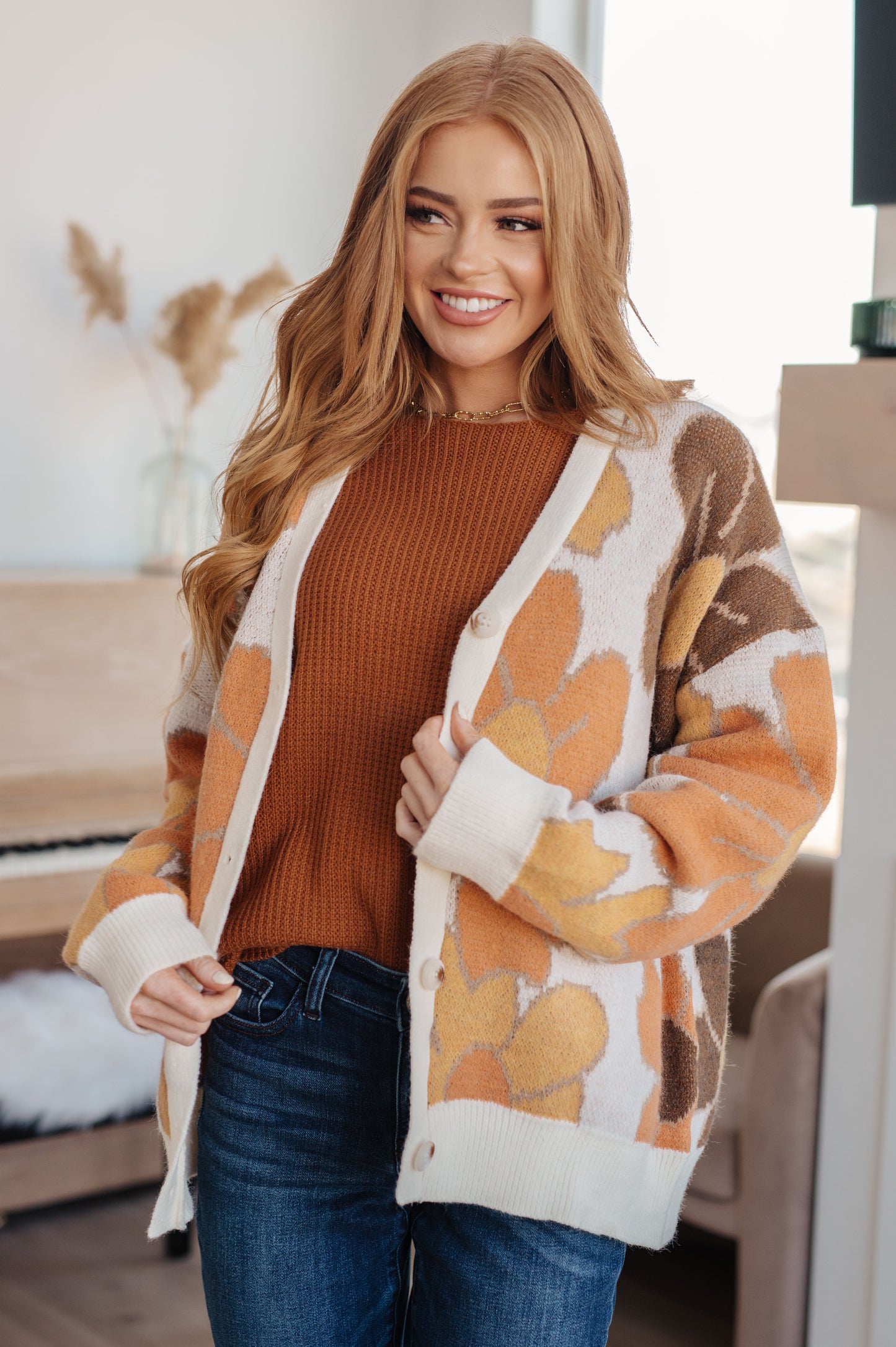 Zizi Rust Sweater Top front view, showing sweater knit texture and relaxed dolman sleeve design