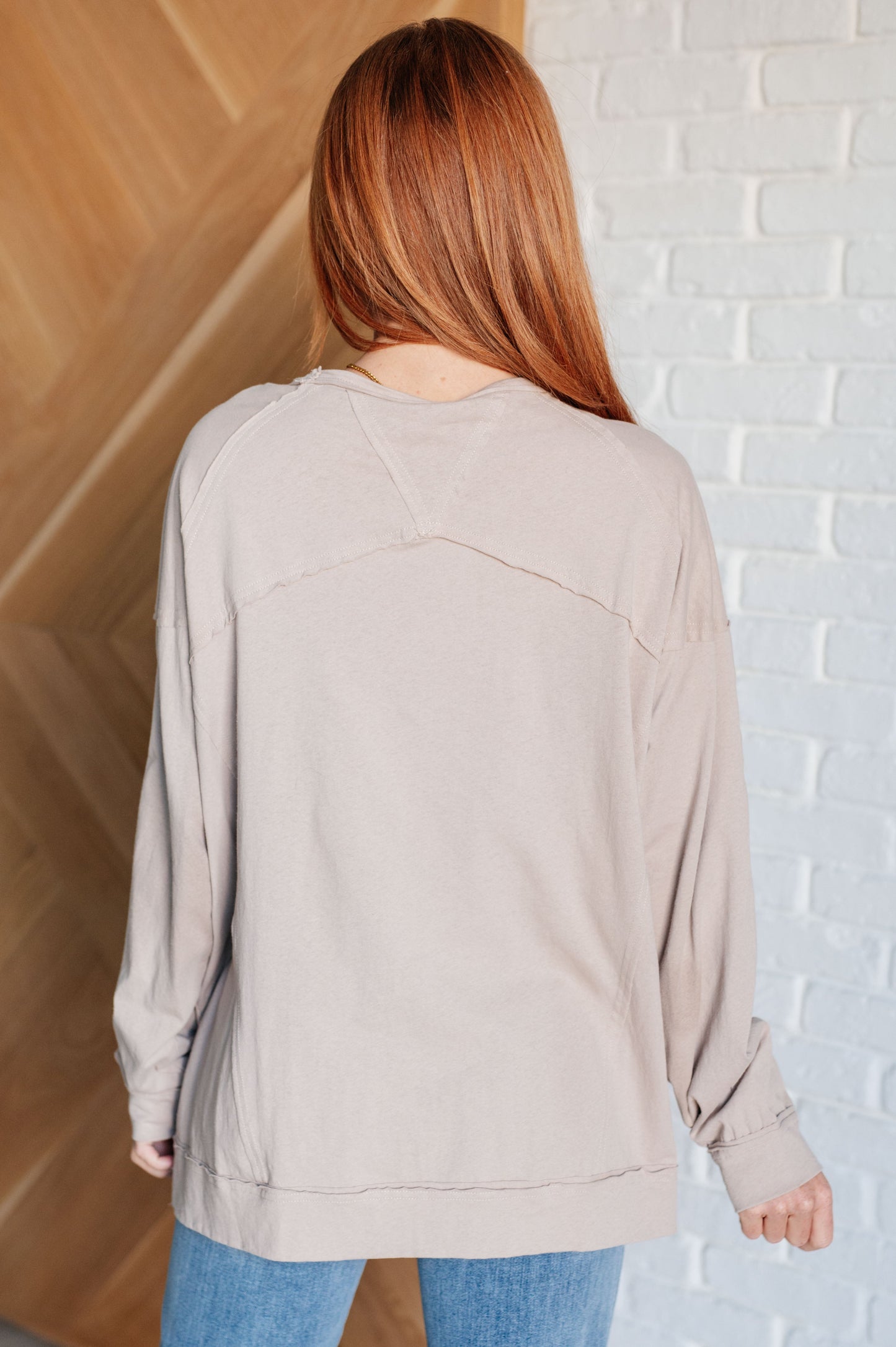 Haven Long Sleeve Top beige back view showing drop shoulders and seam detail