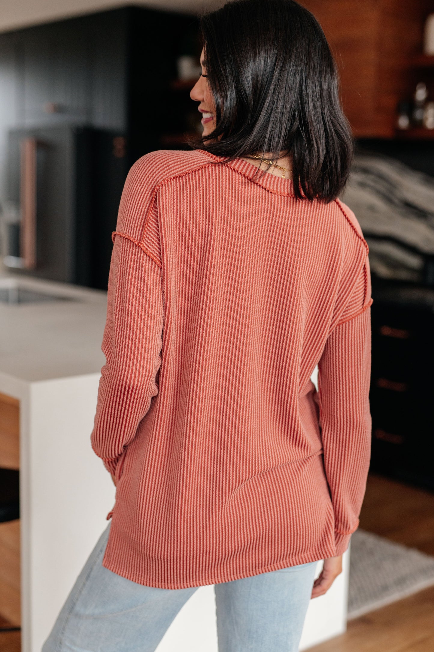 Back view Molly Rib Knit Top showing ribbed knit and stepped hem