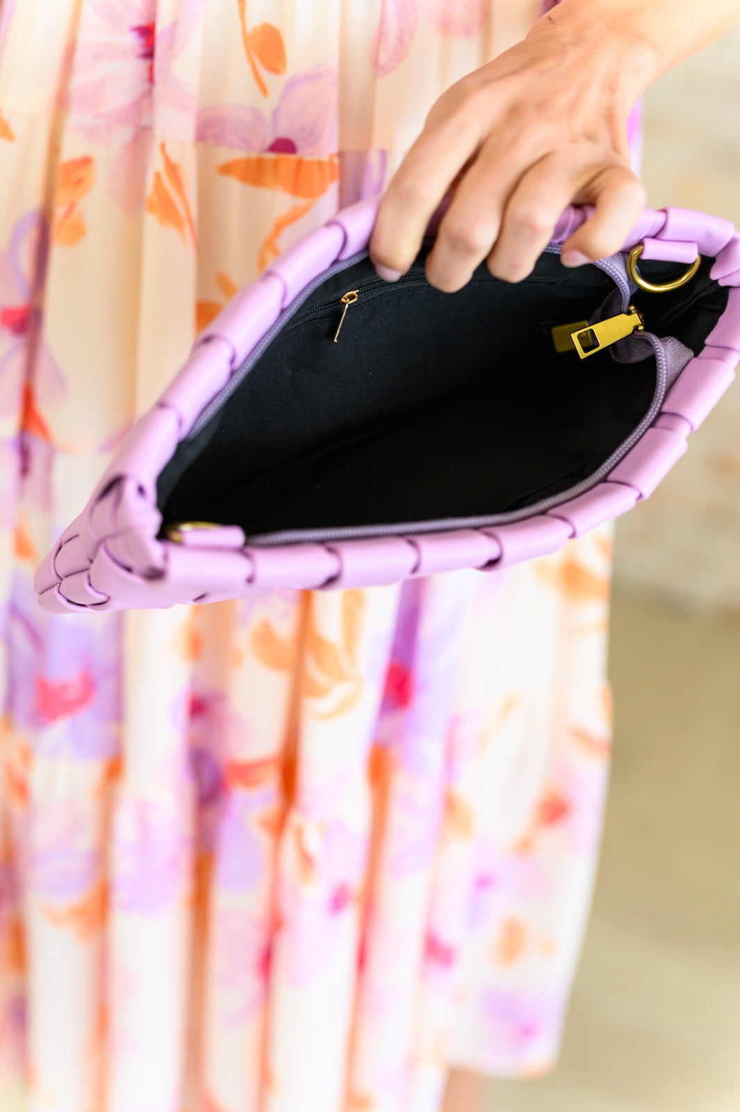 Interior view of Lilia Basket Weave Lilac Purse showing zipper pocket and lined compartment.