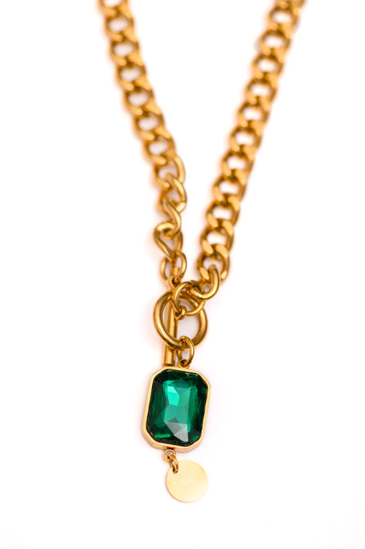 Close-up of Center of It All gold pendant necklace with link chain and extender.