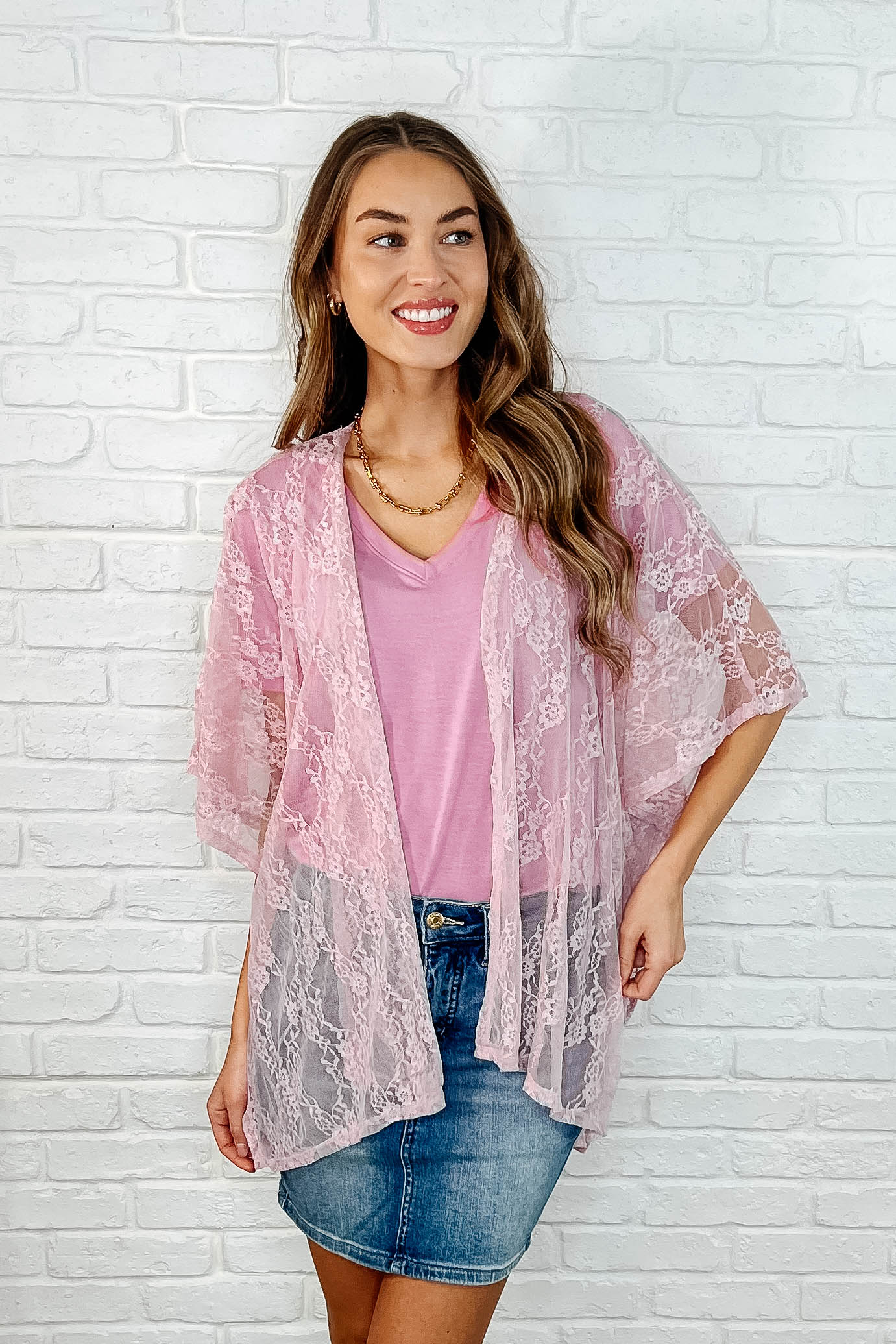 Front view of Dakota Lace Kimono in mauve with open front and dolman sleeves, chic layering essential.