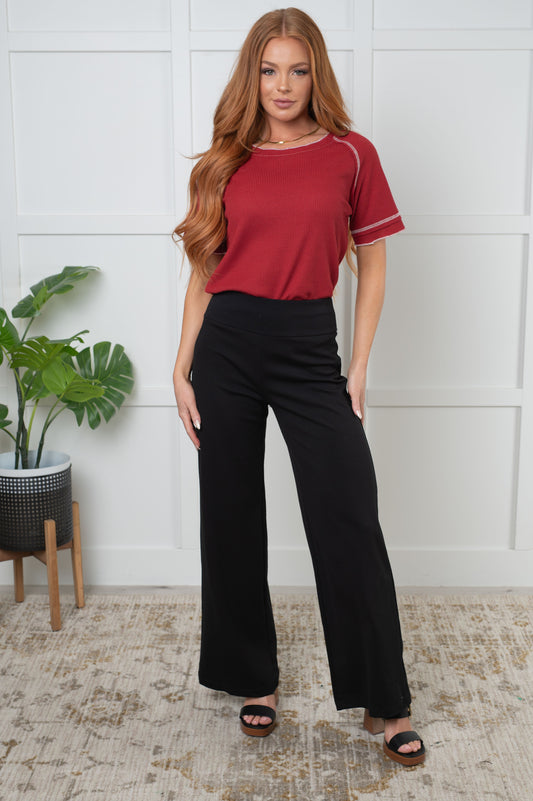 Model full body view of Jaylee Cranberry Waffle Knit Tee, casual top styled with jeans