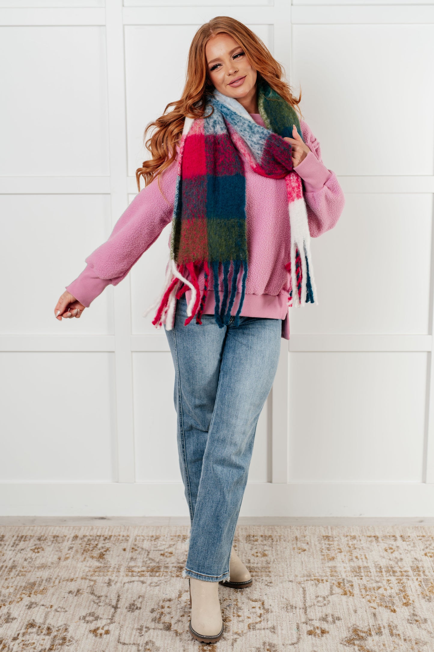 Full body view of Danna Fleece Pullover, styled with jeans and booties