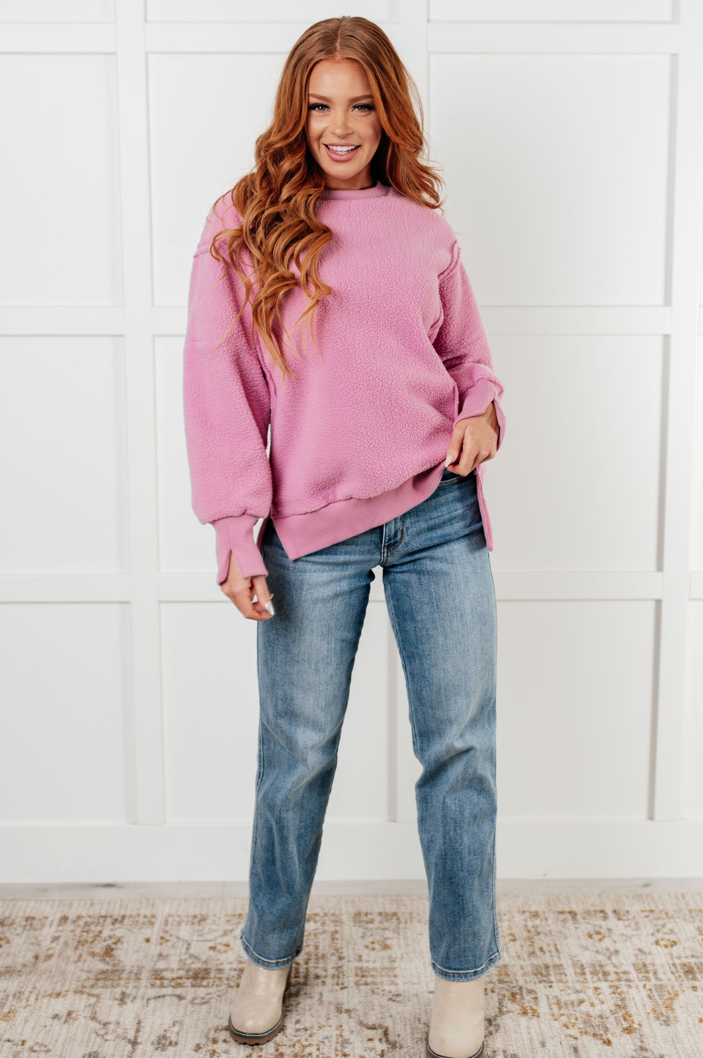 Full body image of Danna Fleece Pullover, pink fleece with plaid scarf styling