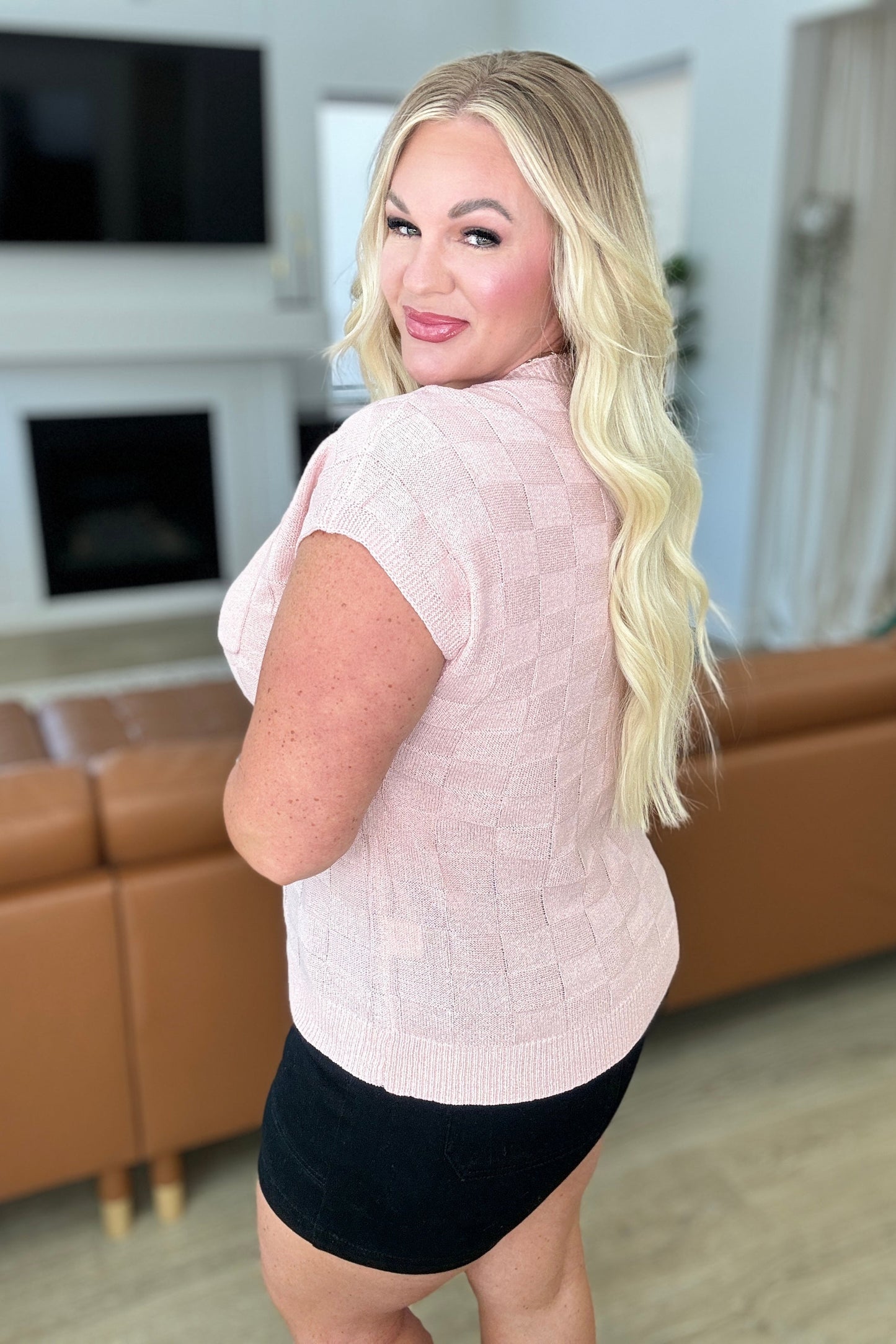 Plus size back view of Karli Check Cap Sleeve Sweater with relaxed silhouette.