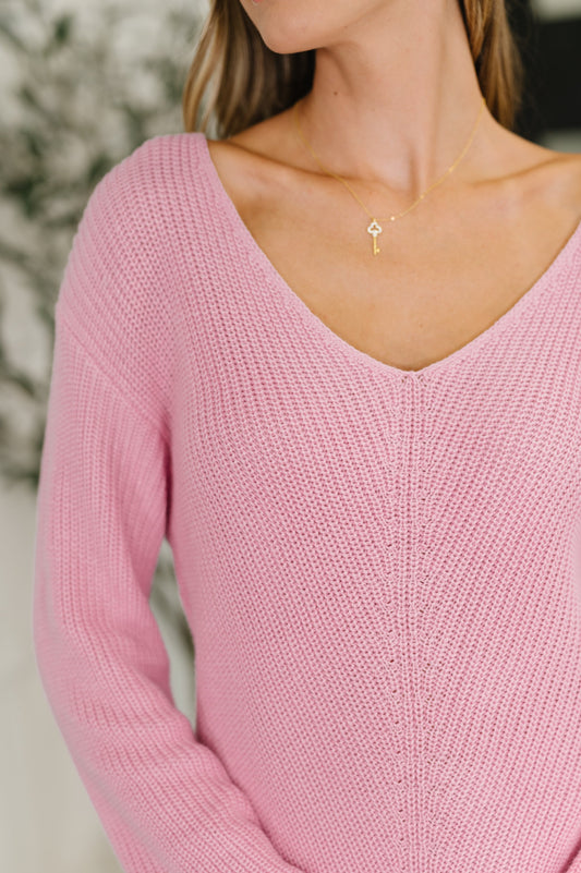 Close-up pink Imogene Sweater, ribbed cuff detail and stretchy mid-weight knit.