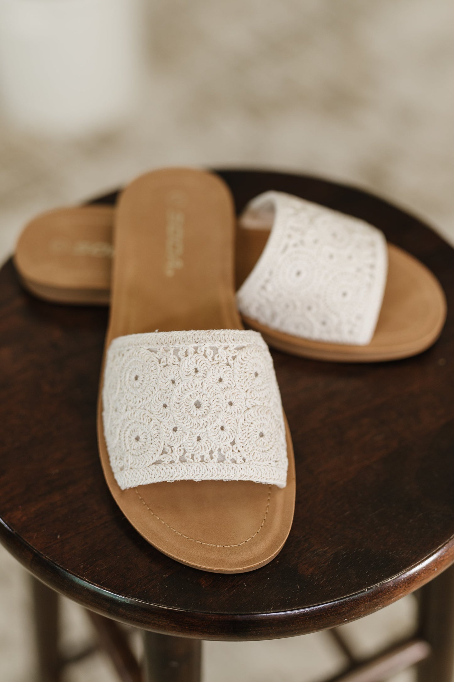 Imelda off white crocheted slip-on sandals with macrame strap, round toe, and rubber sole – summer footwear.
