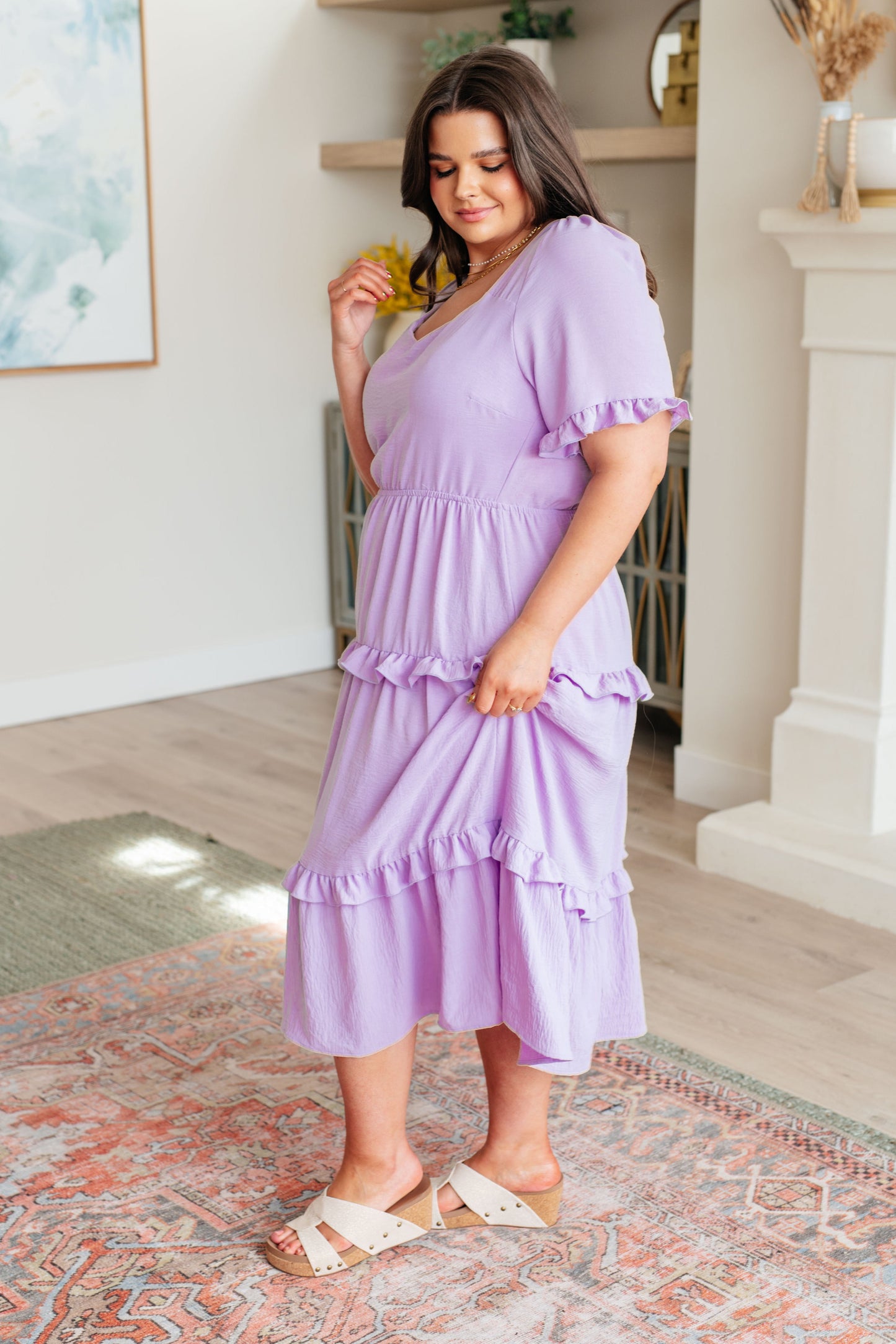 Plus size lavender dress with ruffle cuffs, elastic waist, and tiered skirt – side view