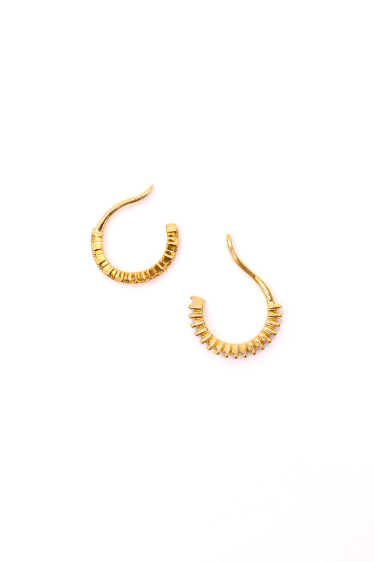 Pair of Ingrid Gold Ear Cuffs featuring two unique cubic zirconia patterns on polished 18K gold-plated finish.