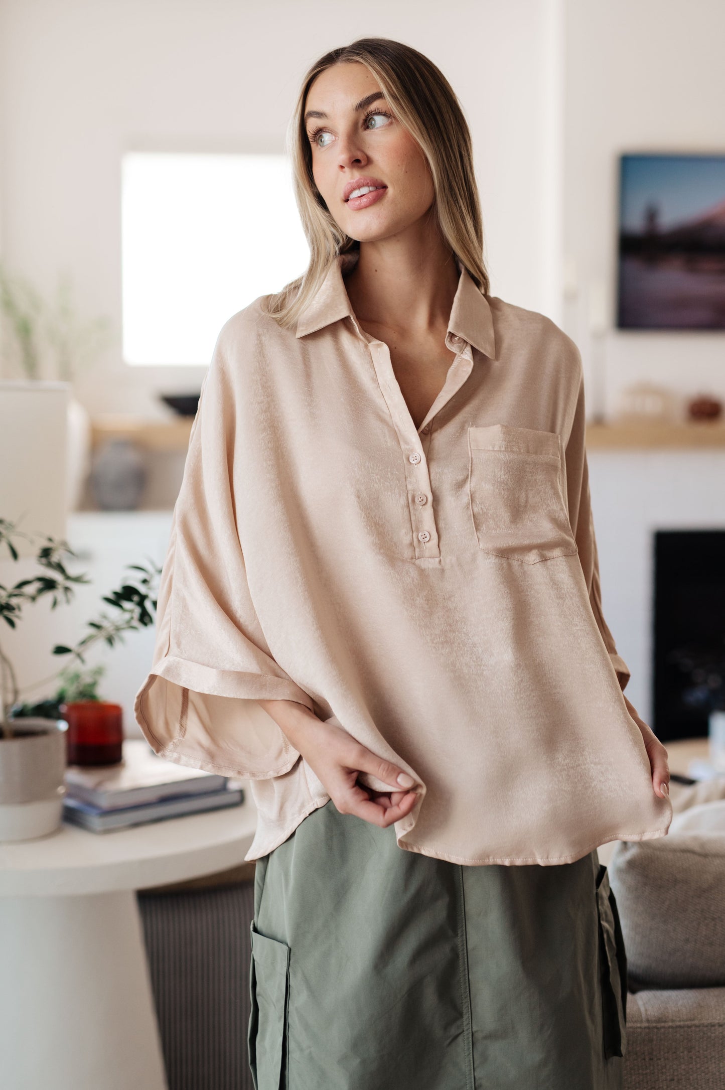 Front view close-up of Ruth Oversized Dolman Sleeve Top with quarter button placket